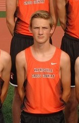 boy in orange tank top